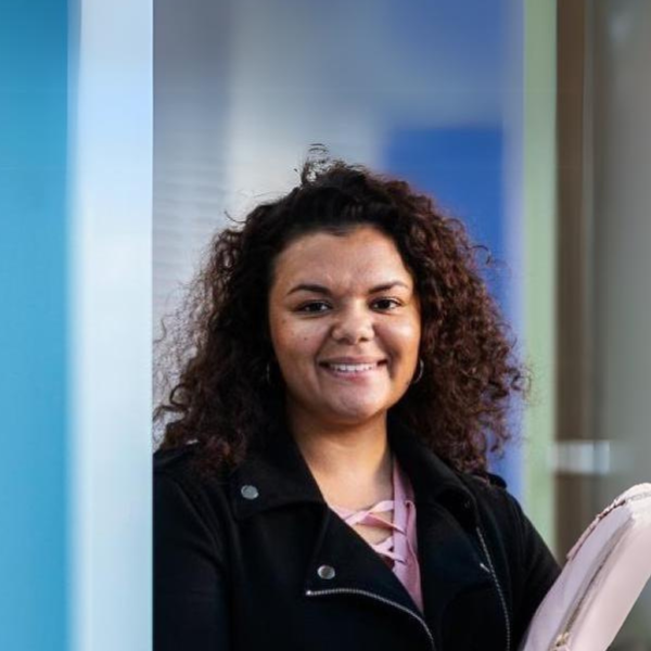 Woman holding a laptop